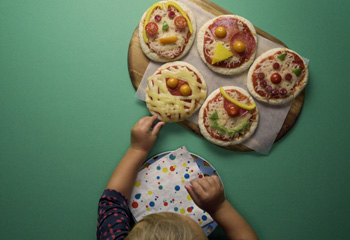 Lustige Pizzagesichter Foto: © Kevin Ilse
