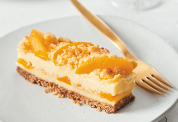 Marillen-Streuselkuchen mit Vanillecreme Foto: © StockFood Marillen-Streuselkuchen mit Vanillecreme Foto: © StockFood